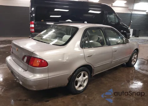 1998 Toyota Corolla Le z USA, uszkodzony, nr VIN 2T1BR18E1WC018347